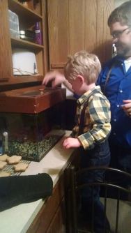 Haddon and I feeding fish